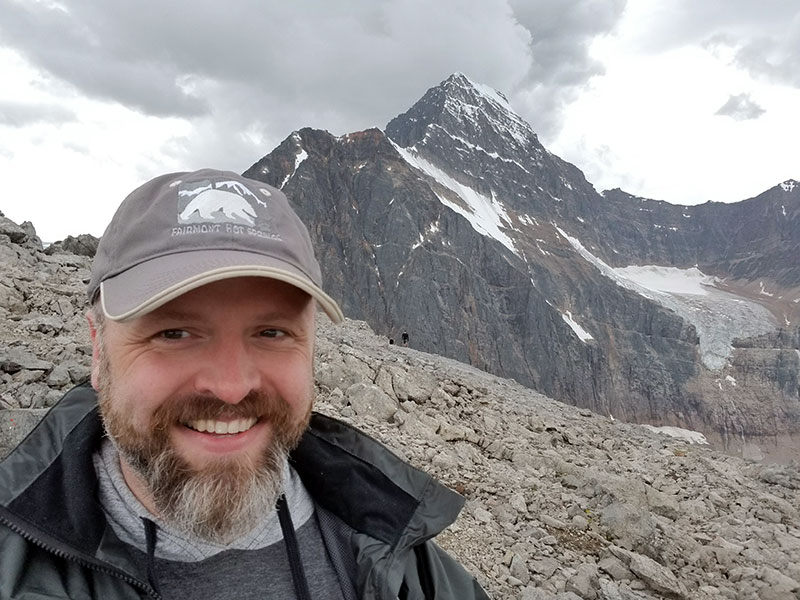 Rick with the mountains